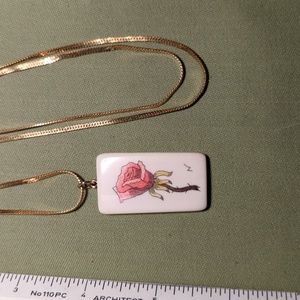 Monet painted rose pendant on gold tone chain